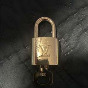 Louis Vuitton Shiny Silver Padlock with Key #310